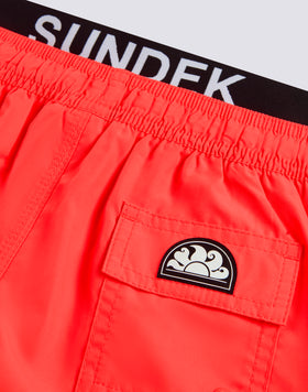 REPREVE® RECYCLED POLYESTER BOYS' SWIMWEAR WITH ELASTICATED LOGO