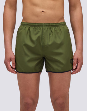 SHORT SWIMSHORTS WITH ELASTICATED WAIST AND ROUND SIDE SLITS