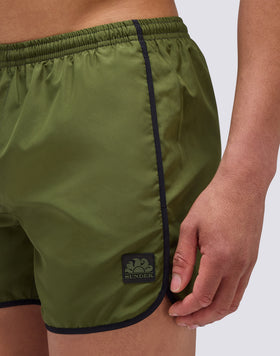 SHORT SWIMSHORTS WITH ELASTICATED WAIST AND ROUND SIDE SLITS