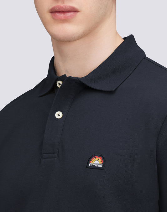 POLO DE ALGODÓN PIQUÉ ELÁSTICO CON PARCHE ARCO IRIS