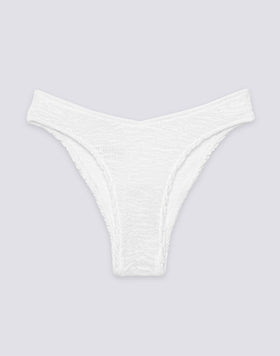 SLIP SGAMBATO A VITA ALTA IN TESSUTO GOFFRATO